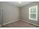 Bedroom with carpeting, ceiling fan, and window with natural light at 1006 Oxford Ridge Rd, Wake Forest, NC 27587