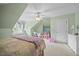 Bright bedroom featuring carpet, a comfy bed, desk, and a fun window seat at 1009 Bentham Dr, Raleigh, NC 27614