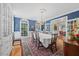 Formal dining room featuring a chandelier, hardwood floors, and elegant decor at 1009 Bentham Dr, Raleigh, NC 27614
