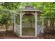 Secluded gazebo nestled among mature trees at 1009 Bentham Dr, Raleigh, NC 27614