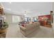 Open living room with fireplace, comfortable seating, and bar area at 1009 Bentham Dr, Raleigh, NC 27614