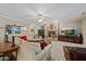 Cozy living room with brick fireplace, plush sofas, and modern TV setup at 1009 Bentham Dr, Raleigh, NC 27614