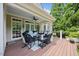 Inviting porch with comfortable seating and a ceiling fan at 1009 Bentham Dr, Raleigh, NC 27614