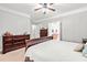 Spacious main bedroom with hardwood floors and ensuite bath access at 1054 Contender Dr, Clayton, NC 27520