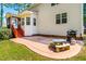 Stamped concrete patio with a grill and a table, offering an ideal space for outdoor dining and relaxation at 1054 Contender Dr, Clayton, NC 27520