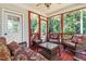 Inviting porch with wicker furniture, perfect for enjoying peaceful outdoor moments at 1054 Contender Dr, Clayton, NC 27520