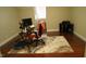 Comfortable bedroom featuring hard flooring, a work space, and a plush area rug at 108 Calloway Road Rd, Rocky Mount, NC 27804
