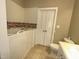 Main bathroom features a walk-in bathtub for accessibility and safety at 108 Calloway Road Rd, Rocky Mount, NC 27804