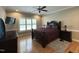 Comfortable main bedroom boasts natural light and a ceiling fan for added comfort at 108 Calloway Road Rd, Rocky Mount, NC 27804