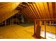 The attic's wooden framework creates an intriguing pattern, revealing the home's structural design at 109 Lake Point Dr, Clayton, NC 27527
