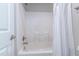 Well-lit bathroom featuring a shower with white fixtures and a shower curtain at 109 Lake Point Dr, Clayton, NC 27527