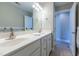 Bright bathroom featuring a double vanity, neutral paint, and tile floors at 109 Lake Point Dr, Clayton, NC 27527