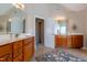 Bright bathroom with dual vanities, large mirrors, and good lighting at 109 Lake Point Dr, Clayton, NC 27527