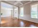 Spacious foyer with elegant finishes, decorative door, and wainscoting at 109 Lake Point Dr, Clayton, NC 27527