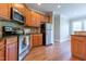 Functional kitchen featuring stainless steel appliances and plenty of cabinet space at 109 Lake Point Dr, Clayton, NC 27527
