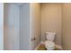Cozy half bathroom with toilet at 109 Lake Point Dr, Clayton, NC 27527