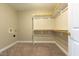A spacious walk-in closet is equipped with rods and shelves, maximizing storage potential at 109 Lake Point Dr, Clayton, NC 27527
