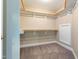 Well-organized walk-in closet featuring ample shelving and rod space for efficient storage solutions at 109 Lake Point Dr, Clayton, NC 27527