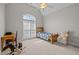 Charming bedroom with a vaulted ceiling, arched window, and ample natural light at 109 San Juan Dr, Chapel Hill, NC 27514