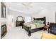 Spacious main bedroom with decorative tray ceiling and adjoining sitting area at 109 San Juan Dr, Chapel Hill, NC 27514