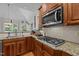 Well-equipped kitchen featuring granite countertops, stainless steel appliances, and ample counter space at 109 San Juan Dr, Chapel Hill, NC 27514