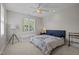 Comfortable main bedroom with a window seat, ceiling fan, and neutral colors at 109 San Juan Dr, Chapel Hill, NC 27514