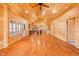 Open layout with living room, kitchen, hardwood floors, and natural light at 1101 Dimmocks Mill Rd, Hillsborough, NC 27278