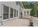Spacious back deck perfect for entertaining, featuring ample seating and easy access to the home's interior at 111 Canberra Ct, Cary, NC 27513