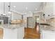 Stylish kitchen featuring custom cabinets, granite countertops, and recessed lighting at 111 Canberra Ct, Cary, NC 27513