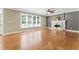 Spacious living room boasting a fireplace, hardwood floors, and plenty of natural light at 111 Canberra Ct, Cary, NC 27513