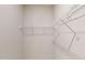 Walk-in closet featuring white wire shelving for ample storage at 1194 Alston Landing Way # 04, Cary, NC 27519
