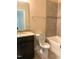 Bathroom featuring a toilet, tub/shower combo with dark wood cabinets and tile backsplash at 1205 Capstone Dr, Durham, NC 27713