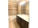 Bathroom featuring a vanity with double sinks, cabinets, and shower/tub combination at 1205 Capstone Dr, Durham, NC 27713