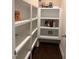 Walk-in pantry featuring custom shelving for optimal storage at 1205 Capstone Dr, Durham, NC 27713