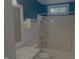 Bathroom featuring a shower with tiled walls and a single sink vanity at 133 Rustic Ln, Smithfield, NC 27577