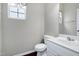 Bathroom with a white vanity, sink, and toilet at 201 Masterwood Way, Morrisville, NC 27560