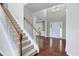 Spacious foyer with hardwood floors and view of a bright front entrance at 201 Masterwood Way, Morrisville, NC 27560