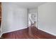 View of stairs and hardwood floors leading from a living room area at 201 Masterwood Way, Morrisville, NC 27560