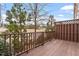 Cozy wooden deck with lattice railing and a scenic view of the surrounding landscape at 2060 Jersey City Pl, Apex, NC 27523