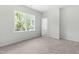 Bright bedroom with large windows and carpet at 2101 Wimberly Woods Dr, Sanford, NC 27330