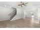 Open living space featuring stairs, an entrance, hardwood floors, and a contemporary ceiling fan at 2101 Wimberly Woods Dr, Sanford, NC 27330