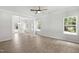 Bright and airy living room boasting hardwood floors, ample natural light, and an open floor plan at 2101 Wimberly Woods Dr, Sanford, NC 27330