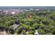 Panoramic aerial perspective with a property pinpointed amid a lush landscape and the skyline of nearby buildings at 225 Vance St, Chapel Hill, NC 27516