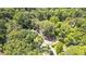 A partial aerial view of a home nestled in a green area with a red boundary indicating the property lines at 225 Vance St, Chapel Hill, NC 27516