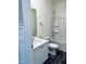 Bathroom featuring a vanity with storage, toilet, and a shower-tub combination at 23 Rolling Banks Dr, Louisburg, NC 27549