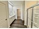 The bathroom boasts dual sinks, a closet, and a walk-in shower with modern flooring at 23 Rolling Banks Dr, Louisburg, NC 27549