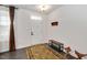 Inviting foyer with a decorative rug, a wooden bench, and a window with a patterned curtain at 232 Randleman Ct, Holly Springs, NC 27540