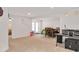 Spacious entertainment room with room for dining table and chairs, plus a separate play area at 232 Randleman Ct, Holly Springs, NC 27540