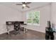Bright office space with a large window, providing ample natural light for a productive work environment at 232 Randleman Ct, Holly Springs, NC 27540