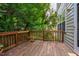 Cozy wooden deck with railing, providing a pleasant outdoor space at 244 Sweet Bay Pl, Carrboro, NC 27510